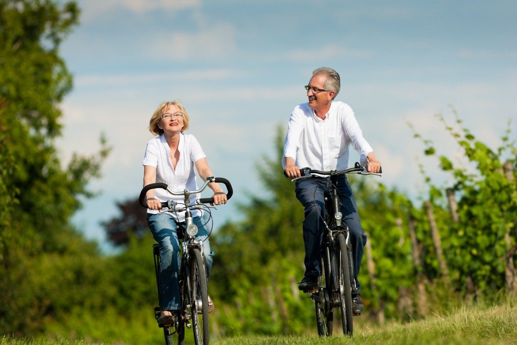 old couple biking