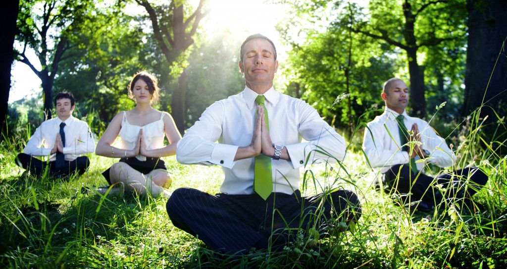business employees meditating