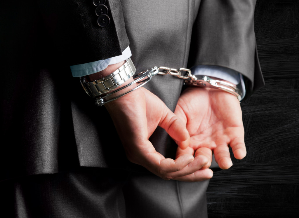 businessman in hand cuffs