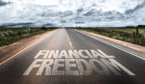 financial freedom written on a road