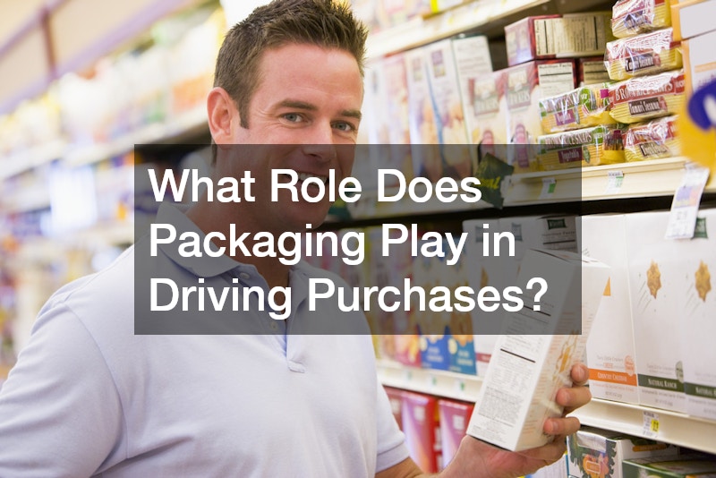 a man holding a boxed packaged good